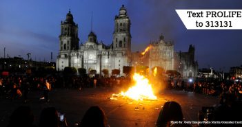 Abortion activists vandalize cars, set fire to buildings in violent protest that leaves dozens injured